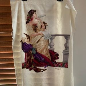 Cross-stitch embroidered.